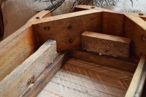 I cut pieces of wood to fit into the underside of the frame. The plywood will be attached to this so the centre of the table has a 2