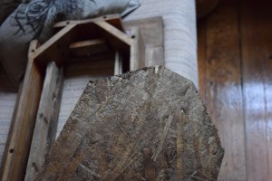 I cut the corners of this plywood so it would fit into the oddly-shaped table frame. I stained the side that would be facing up, visible through the top. 