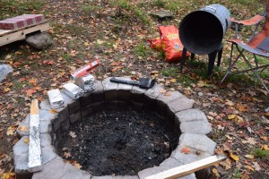 Everything you need to cook your turkey over a campfire - a wooden stake, bricks, lots of tinfoil, at least 2 bags of charcoal, a garbage can and a hammer or hatchet. 