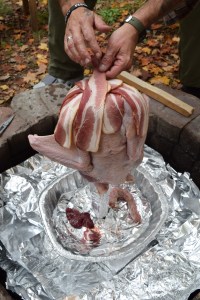 We criss-crossed one pound of bacon across the top of the turkey to keep the bird moist while cooking. 