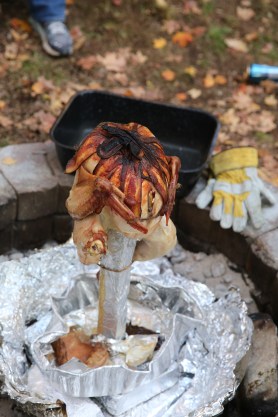 You know it's done when the turkey is golden brown and the bacon is black on top. Yum!